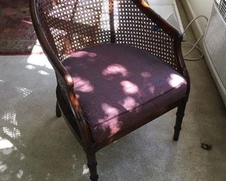 caned faux bamboo chair in garage apartment