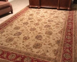 Large rug 7ft- 8 “ x 10ft 10” 
Maroons and tans 
