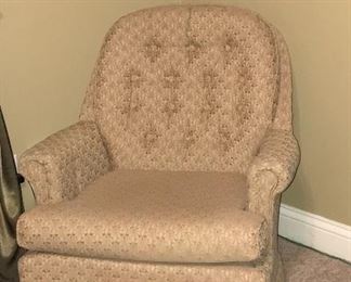 Comfy cream colored rocker.