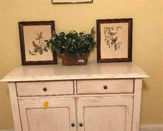 Nice off white dresser and pretty prints