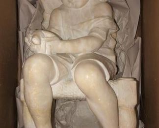 Large seated alabaster child