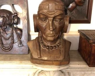 One of 50 or more wood carved busts