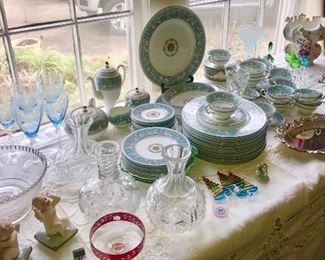 Lots of china, crystal, silver, glassware, beautiful table cloths