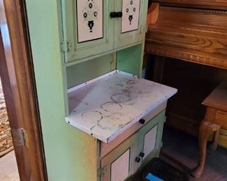 Small child sized Hoosier Cabinet.