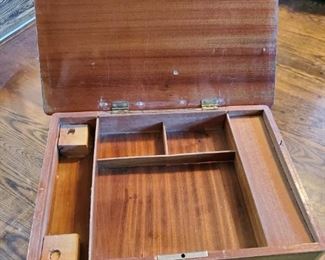 Inside view of small English game table.