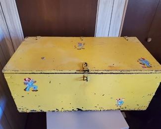 Vintage toy chest with clowns.