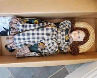 Porcelain doll in box