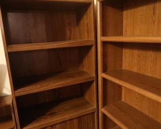 Wood shelving and white cabinets