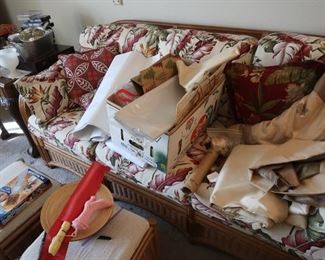 Rattan couch and love seat with foot stool