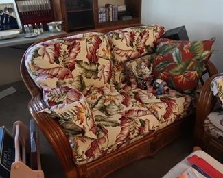 Couch, love seat and foot stool.  Rattan.  