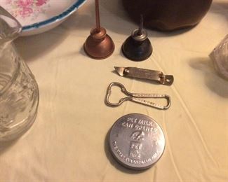 Small oil cans. And Falstaff bottle openers