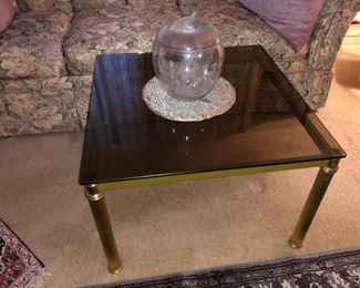 Smoked glass and brass coffee table
