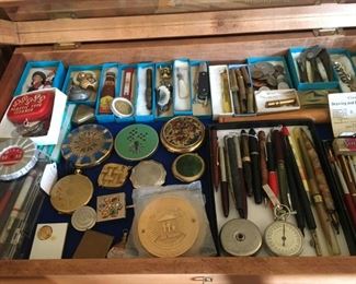 Packed cases of smalls and jewelry