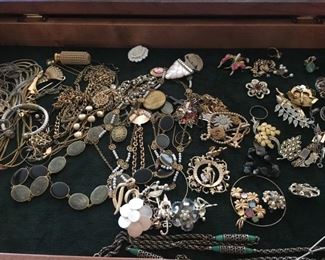 Packed cases of smalls and jewelry