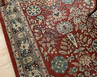 Several high-quality area rugs.