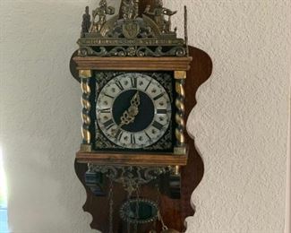 Antique clock, chimes on hour and half.