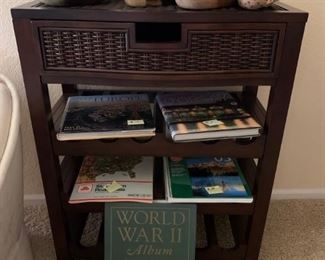 Art and cookbooks + several bookshelves. 