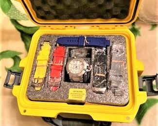 Dozens of INVICTA Watches in Cases