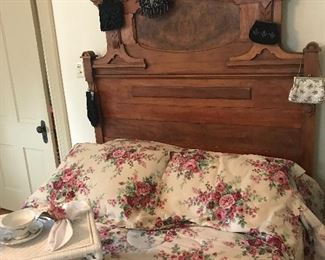 Three piece Victorian bedroom suite in mint condition. Suite includes: High-back bed, Mirrored & Marble Inlayed Dresser and Marble Top Washstand. Literally to die for!