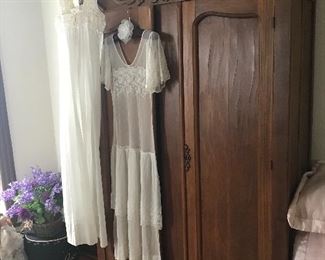 Impressive, this Classic Knock-down Wardrobe make a functional vintage accent piece and is easily broken-down to transport back to your home! Notice the Vintage hand-made clothing!