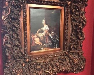 This highly-decorated frame flanks the home’s Front Parlor walls.