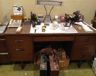 Office: nice desk, vintage lamp, great business cases, vintage phones