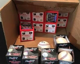 Baseballs and Plexiglass Baseball Holders
