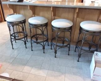 Four lovely swivel top stools in great condition.