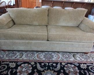 Light brown/tan Bassett sofa, nice and clean.