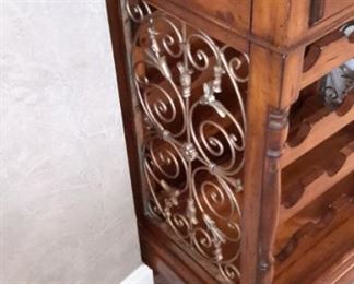 Marble top wine storage with one drawer.