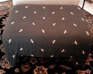 Ottoman with dragonfly pattern.
