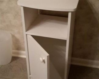 Cute, white cabinet...great for the bathroom.