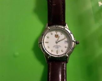 TAG Heuer watch with leather band.