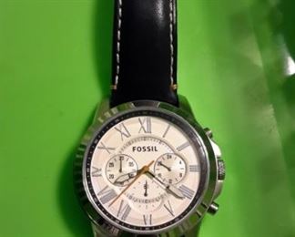 Fossil men's watch with leather strap.