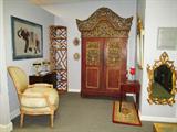 French horse hair arm Chair. Baker dresser. Boudoir lamps slag glass. Corner wicker stand. Painted armoire.
