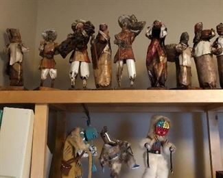these paper mâché figures were made at a reservation in Arizona. and the three figures below are southwestern art figures.