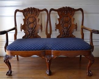 Extensively carved settee