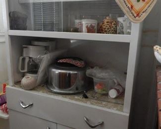 Mid Century metal kitchen cabinet with display. This piece is in pretty good condition too!