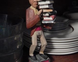 Carved wooden library figurine.