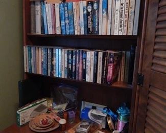 Lots of paper back novels and Agatha Christie mysteries.