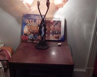 Vintage lighting. Also, a nice side table/ night stand.