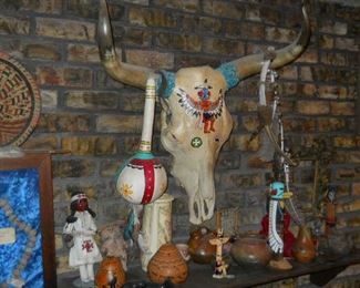 * Genuine hand-painted Texas longhorn 
* Small Indian ceremonial animal skin drums
* Wedding vase pottery by artist Betty Manygoats from the Museum of Northern Arizona gary brinker
* Prehistoric relic necklace (from Pawnee, OK)
