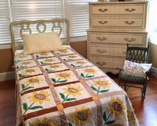 Twin Bed with Sunflower Quilt