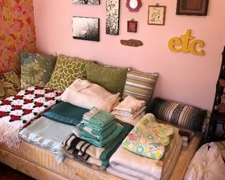 Mattress and box spring (single); large selection of linens and textiles; lots of artwork throughout the house.