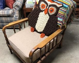 Chair by Stickley Bros.; fun vintage needlework owl and blankets.