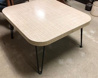Retro table with hairpin legs.