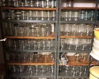 Shelves full of canning jars. Other canning supplies available, as well.