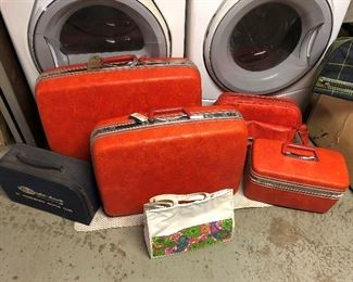 Cool set of retro red luggage by Samsonite.