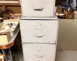 Pair of old metal filing cabinets.