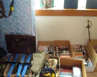 3rd Floor Bedroom Left:  $1 and 2$ Box of Army belts, etc.  Box of Vhs Tapes